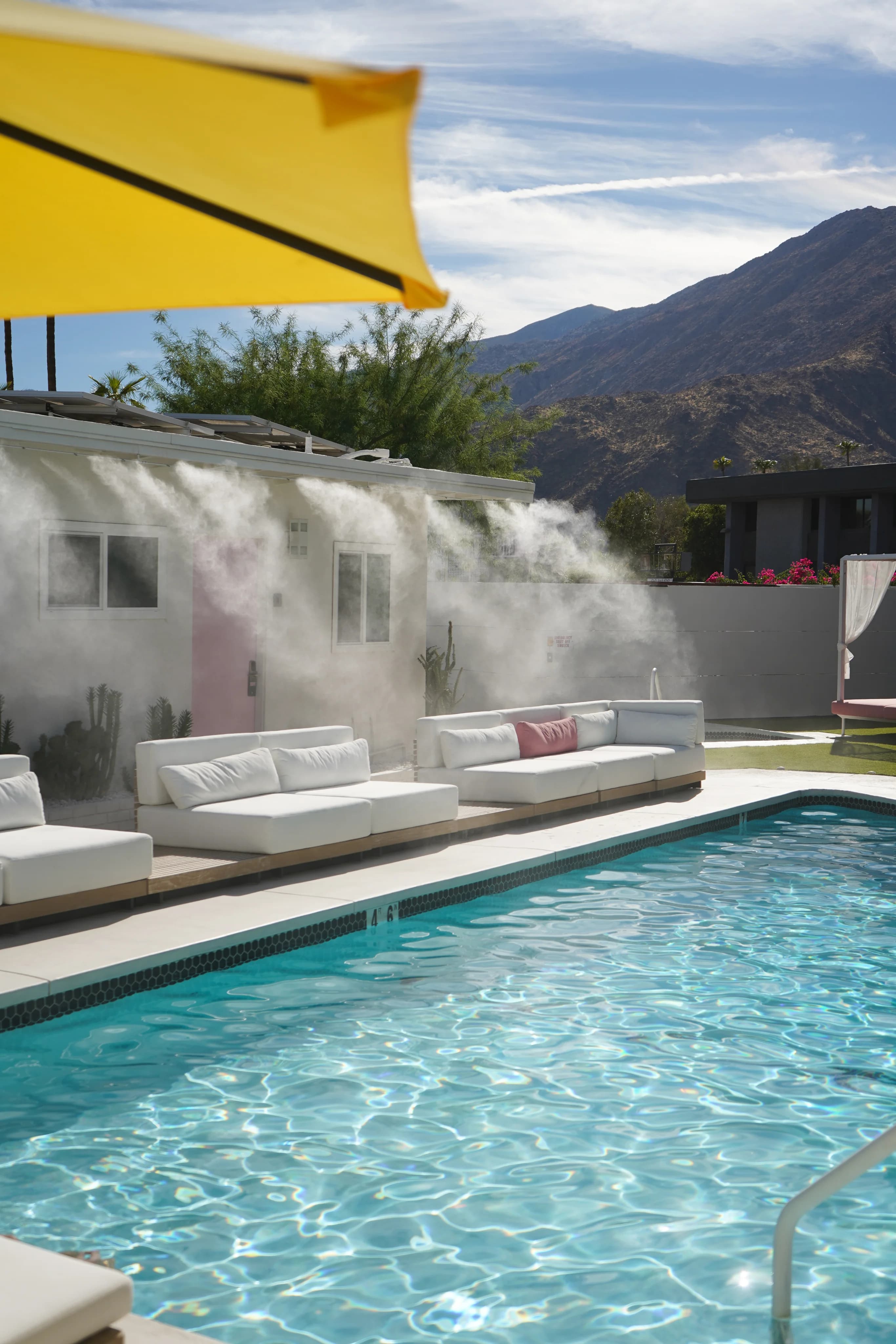 Poolside misting system to beat the summer heat